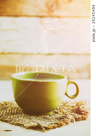 hot smoke coffee on wood table background 26245494
