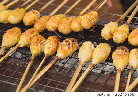 Grilled sticky rice with egg or Khao Jee Grilled sticky rice with egg or Khao Jee 26245859
