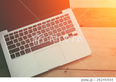 laptop on wooden table, work morning laptop on wooden table, work morning 26245934
