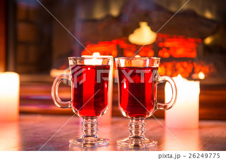 Beautiful Two glasses of mulled wine on bokeh 26249775