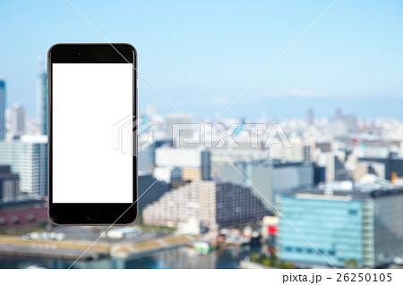 スマホ　携帯電話　スマートフォン　都市風景　東京　不動産イメージ 26250105