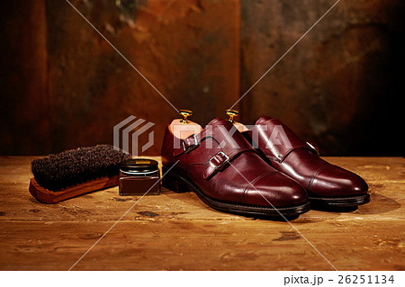 Still life with men's leather shoes and 26251134