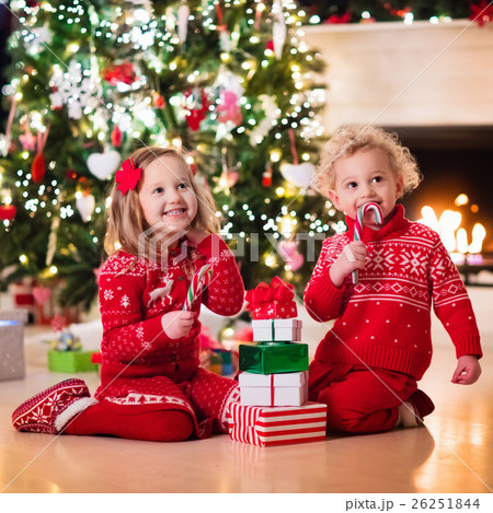 Kids under Christmas tree Kids under Christmas tree 26251844