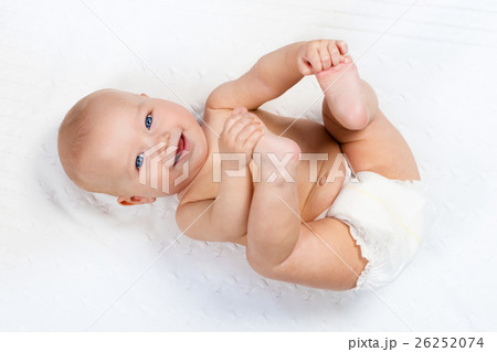 Little baby wearing a diaper 26252074