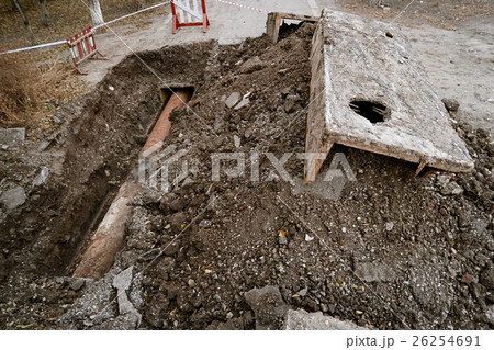 Rusty water pipe in the trench abview 26254691