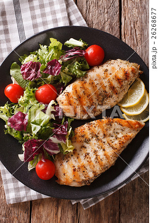 Grilled chicken breast with mixed salad close-up 26268677