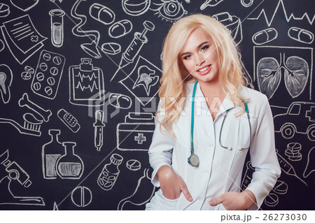 Beautiful blonde woman doctor in glasses and white Beautiful blonde woman doctor in glasses and white 26273030