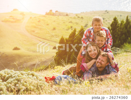 Family of four people looking to beautiful 26274360