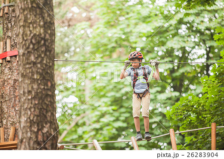 Child in a adventure playground 26283904