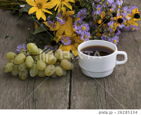cluster of grapes, coffee and bouquet flowers cluster of grapes, coffee and bouquet flowers 26285334