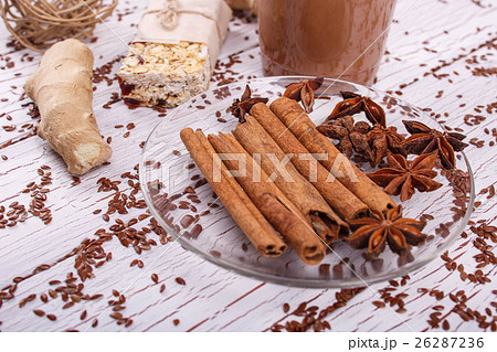 brown cinnamon sticks and grain clove lie brown cinnamon sticks and grain clove lie 26287236