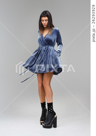 Cute women in a dress dancing, spinning 26293929