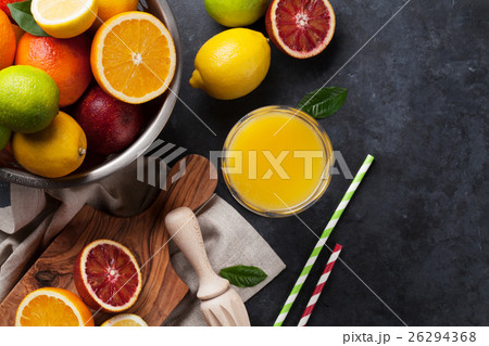 Fresh ripe citruses and juice 26294368