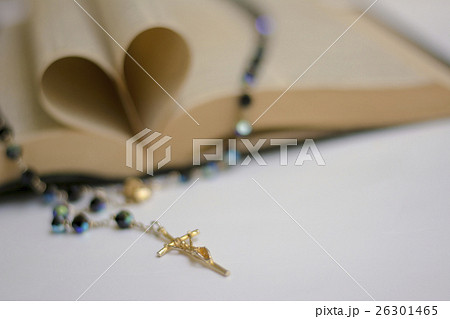Rosary Beads on an love shape Open Bible 26301465