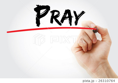 Hand writing PRAY with marker 26310764