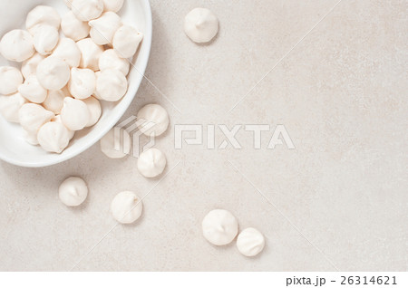 White meringues on the white plate White meringues on the white plate 26314621