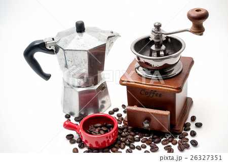Cup of coffee with coffee maker on white Cup of coffee with coffee maker on white 26327351
