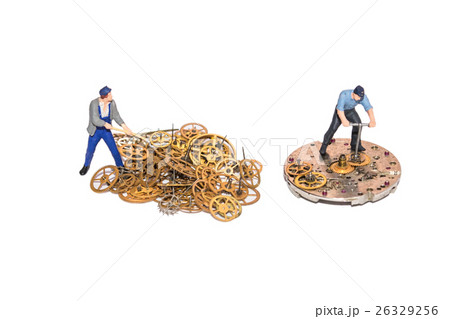 Miniature people repairing clockwork. Teamwork. Working employees. 26329256