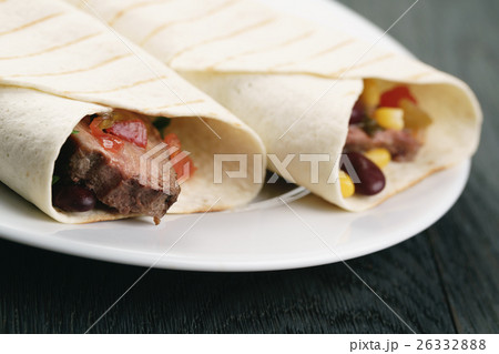 burritos with beef steak, corn, black beans and salsa burritos with beef steak, corn, black beans and salsa 26332888