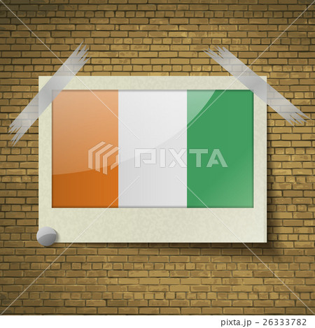 Flags Cote dlvoire at frame on a brick background. 26333782