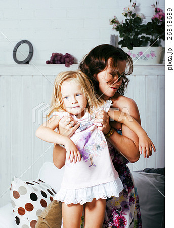 happy smiling mother with little cute daughter at 26343639