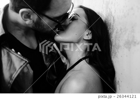 man and woman kissing in abandoned places 26344121