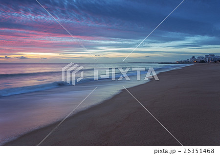 Pink sunset on the beach in Quarteira. Pink sunset on the beach in Quarteira. 26351468
