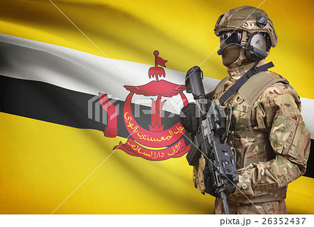 Soldier in helmet holding machine gun with flag on background series - Brunei 26352437