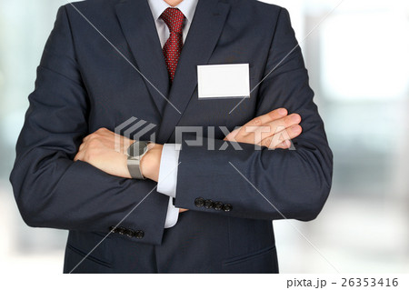 business man in a modern suit with a  Blank Badge 26353416