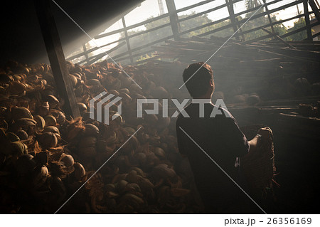 Rear view of worker in old factory 26356169