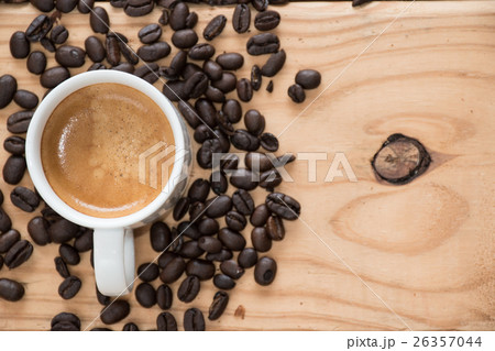 Espresso cup with coffee beans. Espresso cup with coffee beans. 26357044