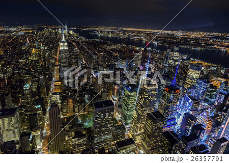 USA, New York, New York City, Illuminated skyline at night seen from helicopter cockpit 26357791