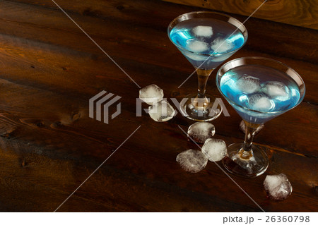 Blue cocktail with ice, copy space Blue cocktail with ice, copy space 26360798
