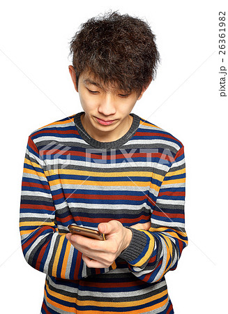 Young man using mobile phone texting 26361982