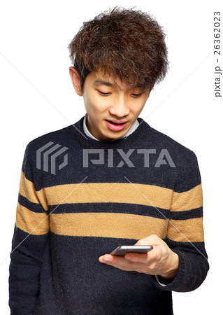 Young man using mobile phone on white background 26362023