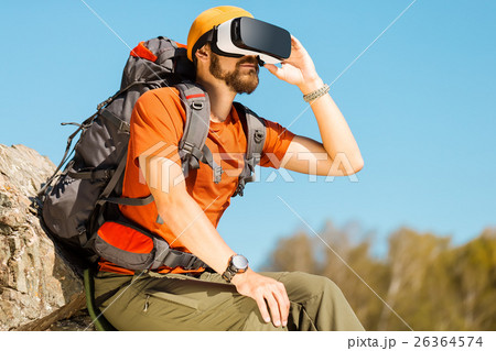 Successful young man, using virtual reality 26364574