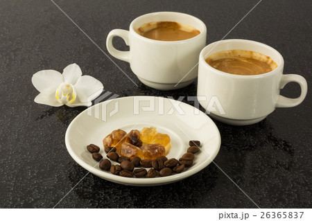 White coffee cups and white orchid 26365837