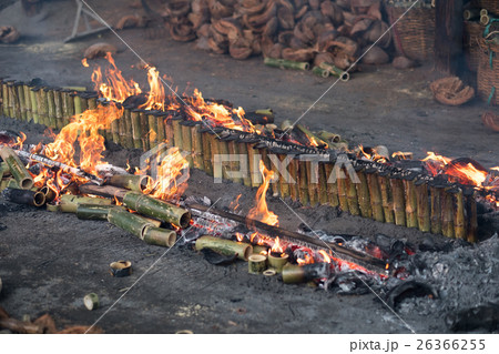 Burning bamboo rice in traditional cooking 26366255