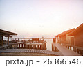 houses on piles on water at the time sunset 26366546