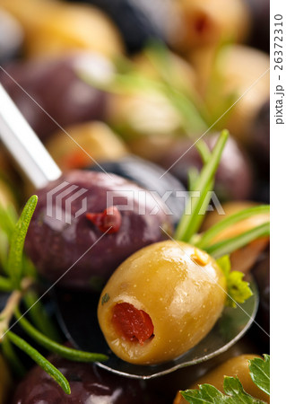 Marinated olives with herbs. Marinated olives with herbs. 26372310