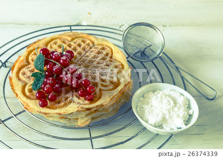 stacked homemade waffles to cool stored stacked homemade waffles to cool stored 26374339