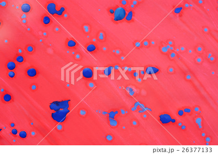 pink background with drops of blue 26377133