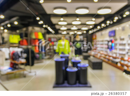 Abstract blurred photo of fashion store in shopping mall which have clothing bag and shoes, shopping concept 26380357