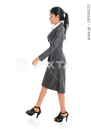 Indian business woman walking Indian business woman walking 26384222