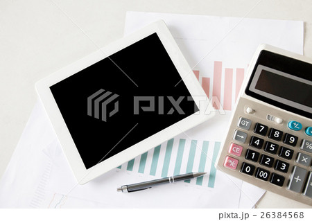 Blank digital tablet on stock and finance papers 26384568