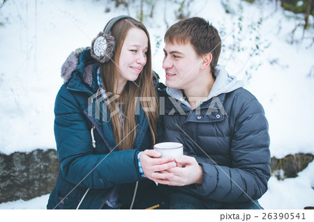 Loving couple having fun outdoors in winter Loving couple having fun outdoors in winter 26390541