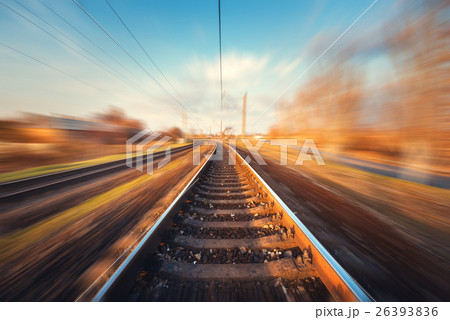 Railroad in motion. Blurred railway station Railroad in motion. Blurred railway station 26393836