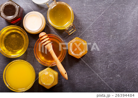 various types of honey in glass jars various types of honey in glass jars 26394484
