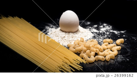 Close up of pasta spaghetti and eggs lying on 26399162