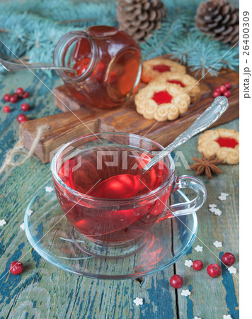 Cup of tea and Christmas decorations 26400309